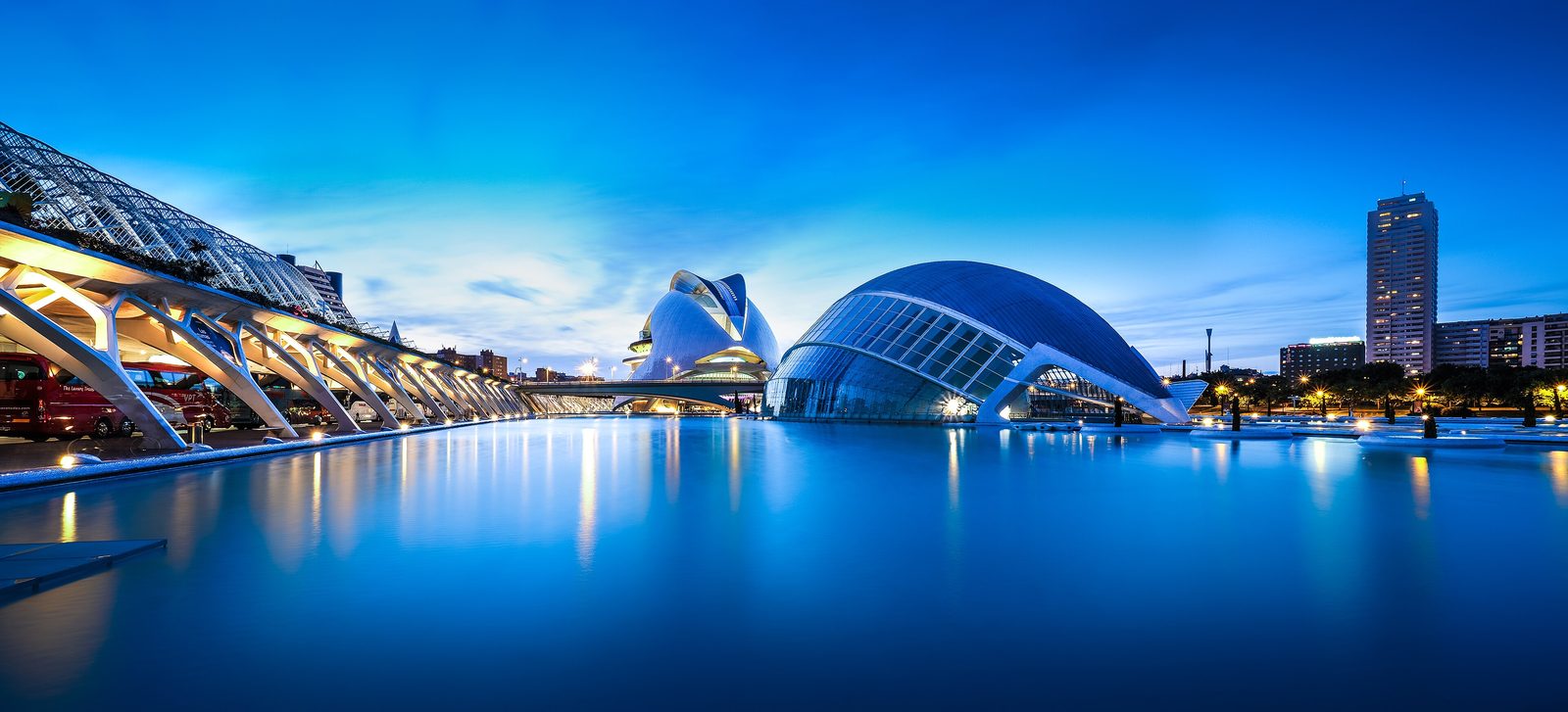 The City of Arts and Sciences in Valencia reflected in the water at blue hour